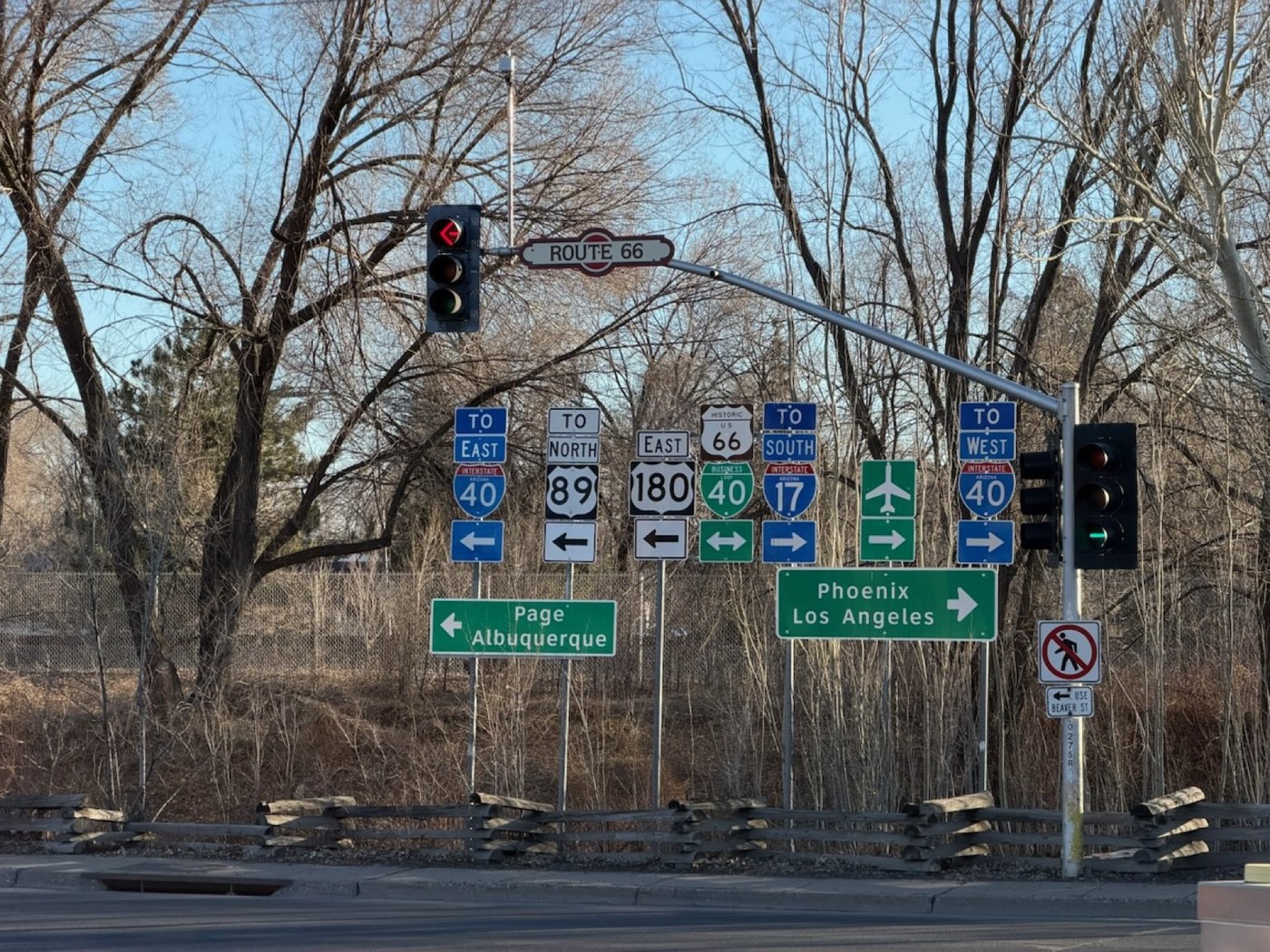 A cluster of Historic Route 66 highway signs in Flagstaff